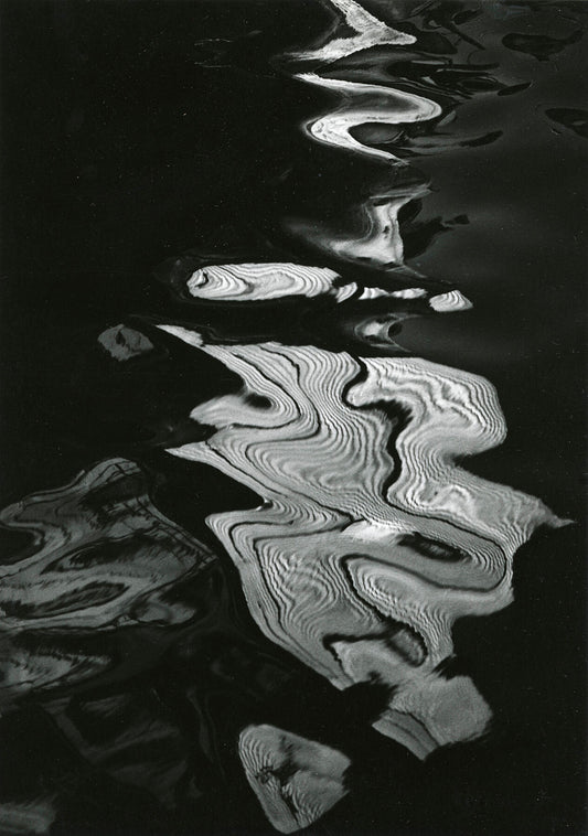Unframed black and white print ‘Water Reflections’ by Brett Weston:  An evocative abstraction is capturing the essence of water's dance.
