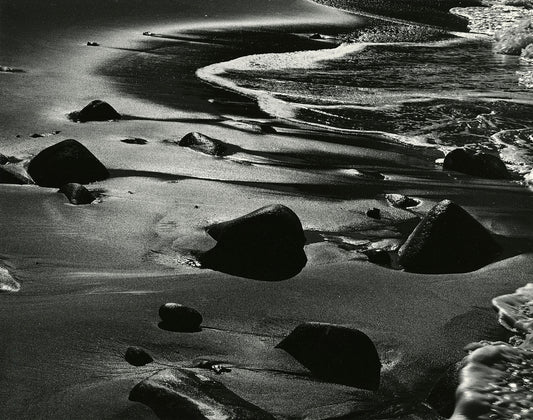 Unframed black and white print ‘Rocks Water Coast California’ by Brett Weston: An evocative photograph of an ocean coast with scattered rocks