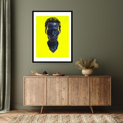Image of the black framed fine art print  ‘Maamour’ by the Contemporary artist Aaron Bevan-Bailey, Afrofuturist portrait of a black man on a bright yellow background