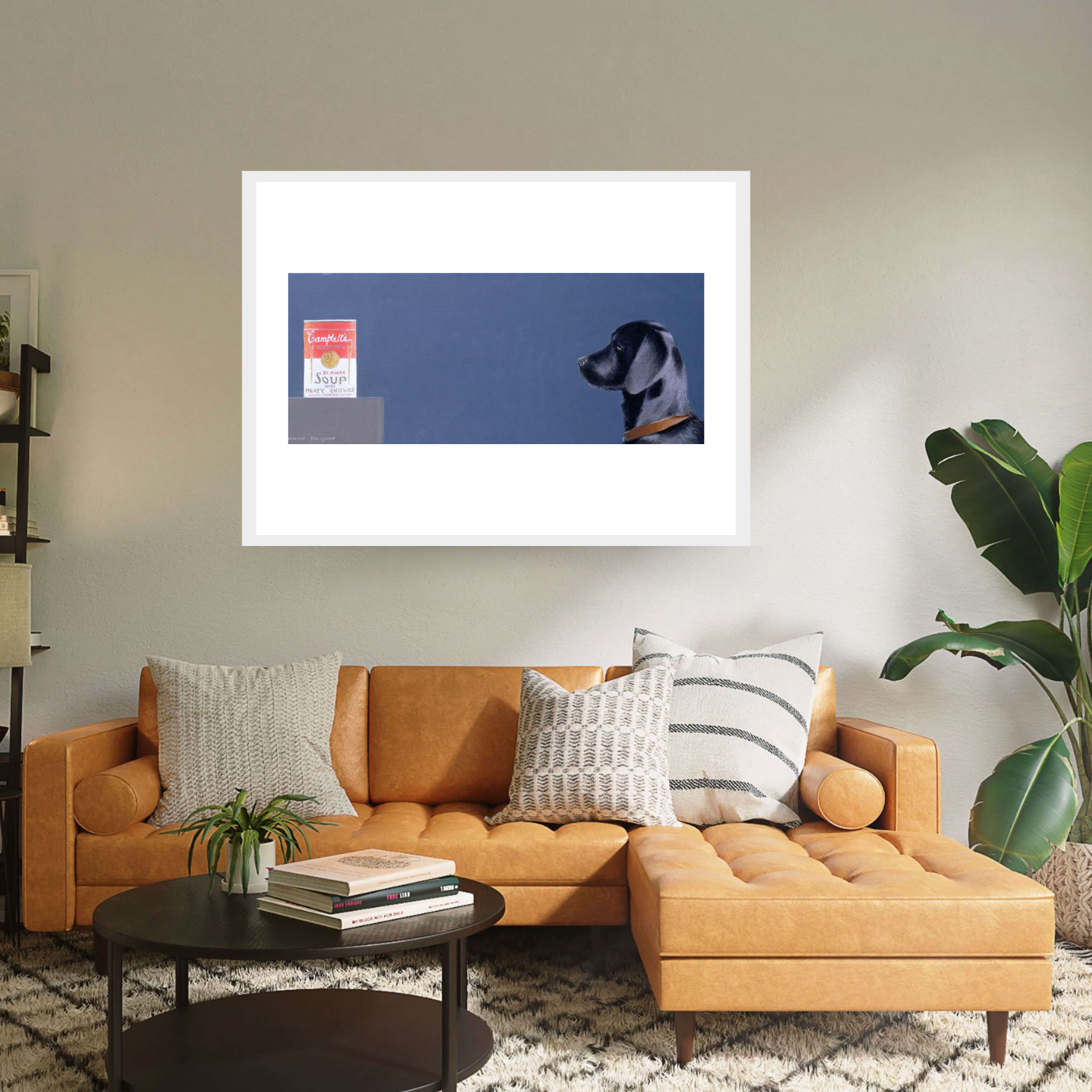 Experience the surreal "Black Dog with Campbell's Soup, 2020" by Lincoln Seligman. This print showcases a black dog facing a counter with Campbell's soup against a deep blue backdrop. Now available as a white framed archival digital print.