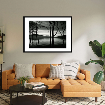 A Black framed black and white print titled ‘Lake Patzcuaro Mexico’ by Brett Weston: Discover tranquillity with this serene view of Lake Patzcuaro in Mexico, framed by trees and mountains.