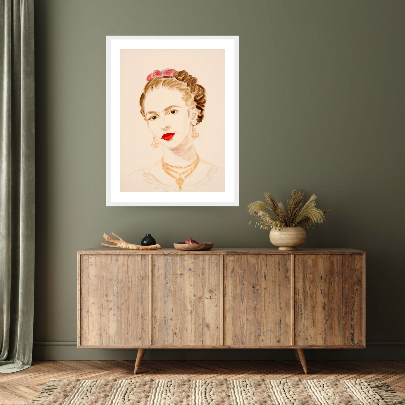 Image of the white framed print ‘Frida Kahlo’ by Annie Kevans, depicting the mexican artists Frida kahlo with her characteristic bright red lipstick 