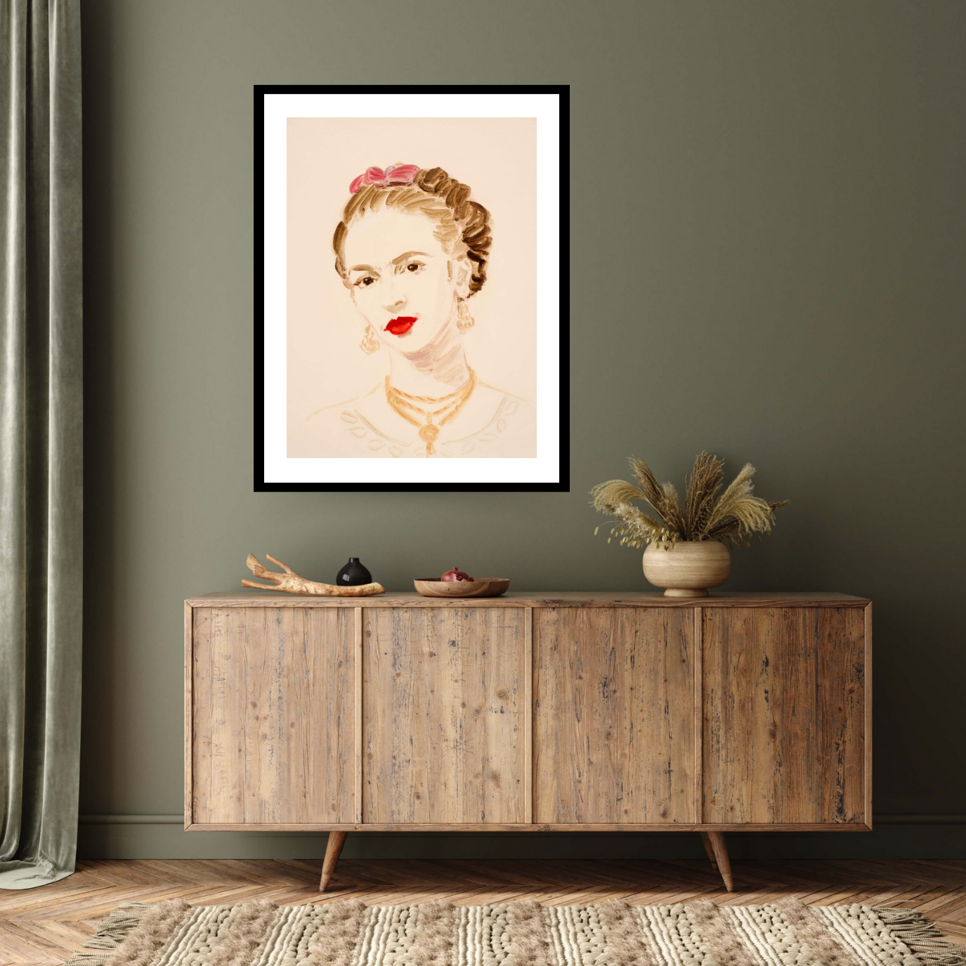 Image of the black framed print ‘Frida Kahlo’ by Annie Kevans, depicting the mexican artists Frida kahlo with her characteristic bright red lipstick
