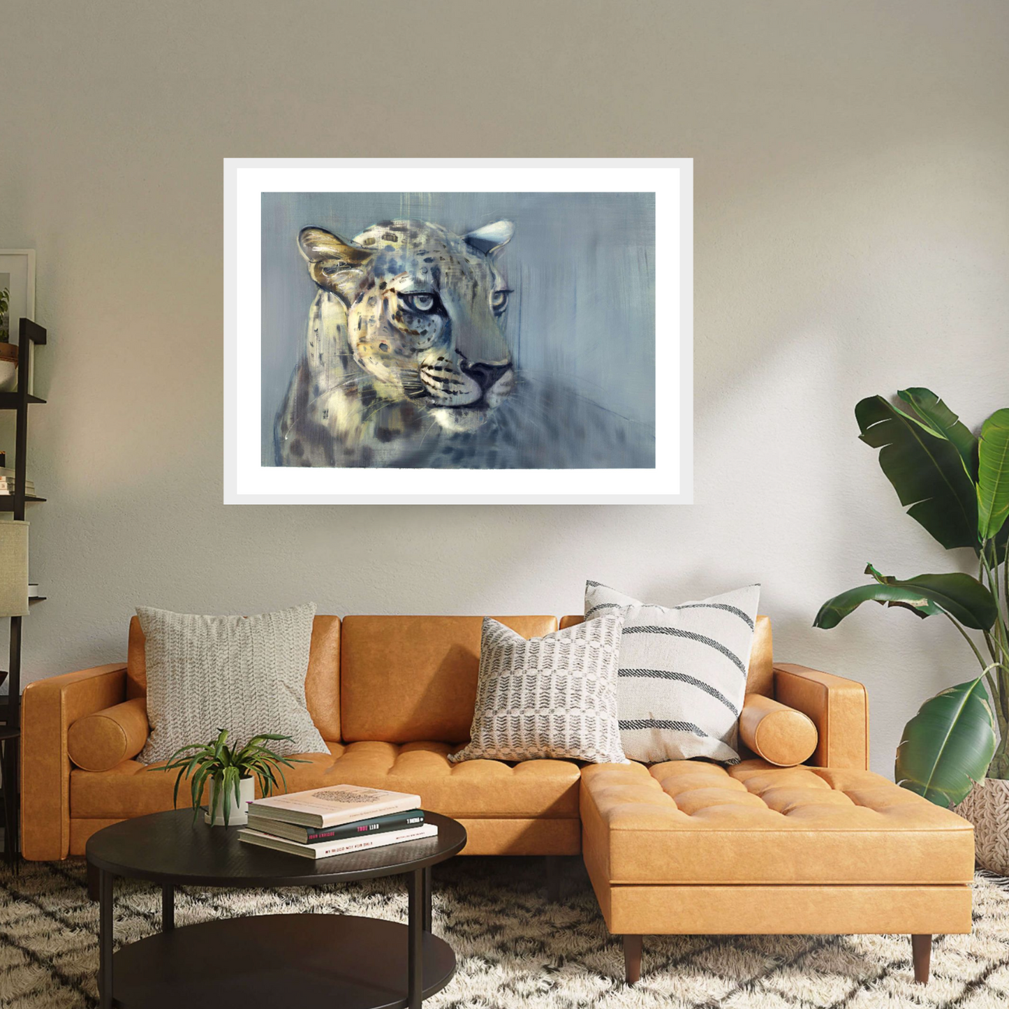 White framed ‘Predator II' by Mark Adlington. This artwork depicts an Arabian leopard with piercing eyes, blending seamlessly into its surroundings. Available as fine art prints, it's a captivating addition to any collection, capturing the elusive beauty of wildlife with stunning detail.