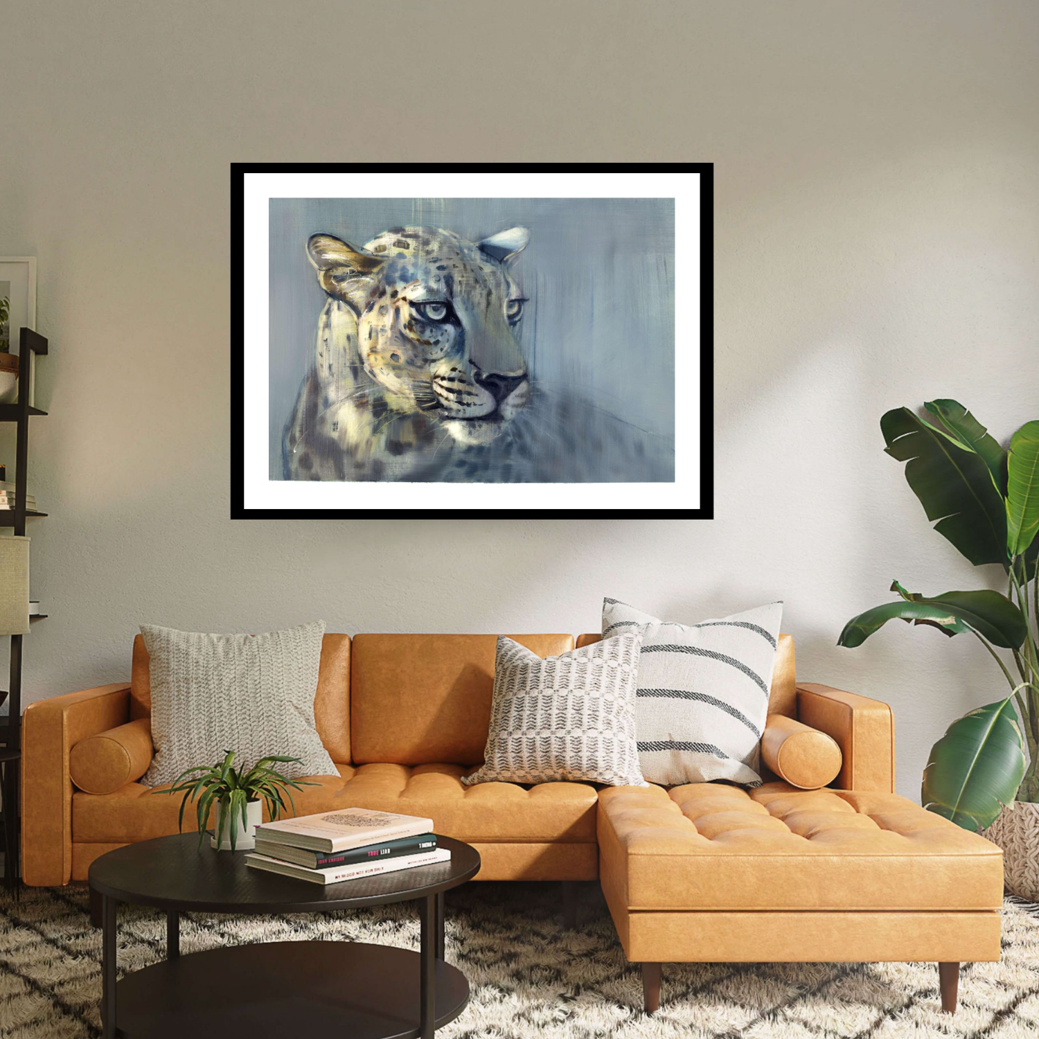 Black framed 'Predator II' by Mark Adlington. This artwork depicts an Arabian leopard with piercing eyes, blending seamlessly into its surroundings. Available as fine art prints, it's a captivating addition to any collection, capturing the elusive beauty of wildlife with stunning detail.